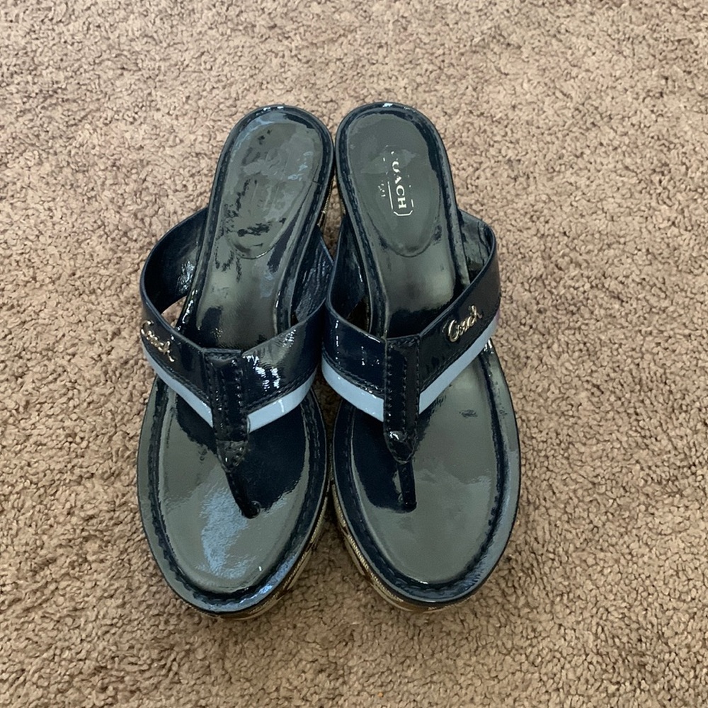 Good used condition, navy blue Coach wedge sandals.